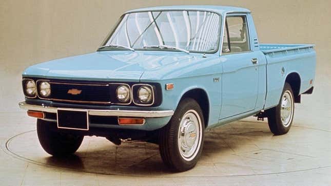 A blue Chevrolet LUV pickup truck sitting inside a circle on a white marble floor