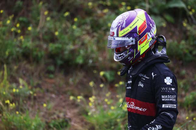 Zhou Guanyu of China and Alfa Romeo F1 walks back to the pitlane after stopping on track during final practice ahead of the F1 Grand Prix of The Netherlands at Circuit Zandvoort on August 26, 2023 in Zandvoort, Netherlands