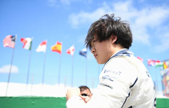 Yuki Tsunoda of Japan and Scuderia AlphaTauri looks on, on the grid prior to the F1 Grand Prix of Brazil at Autodromo Jose Carlos Pace on November 05, 2023 in Sao Paulo, Brazil.